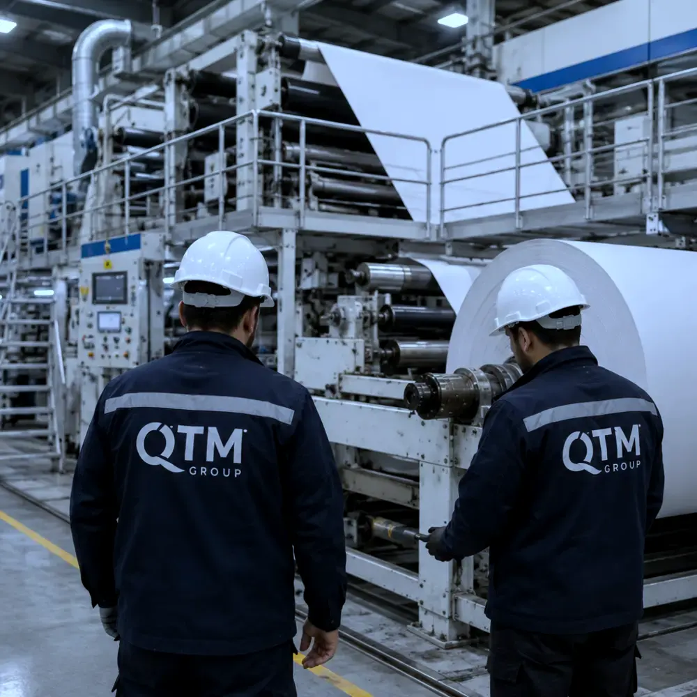 QTM Group team at a paper production line
